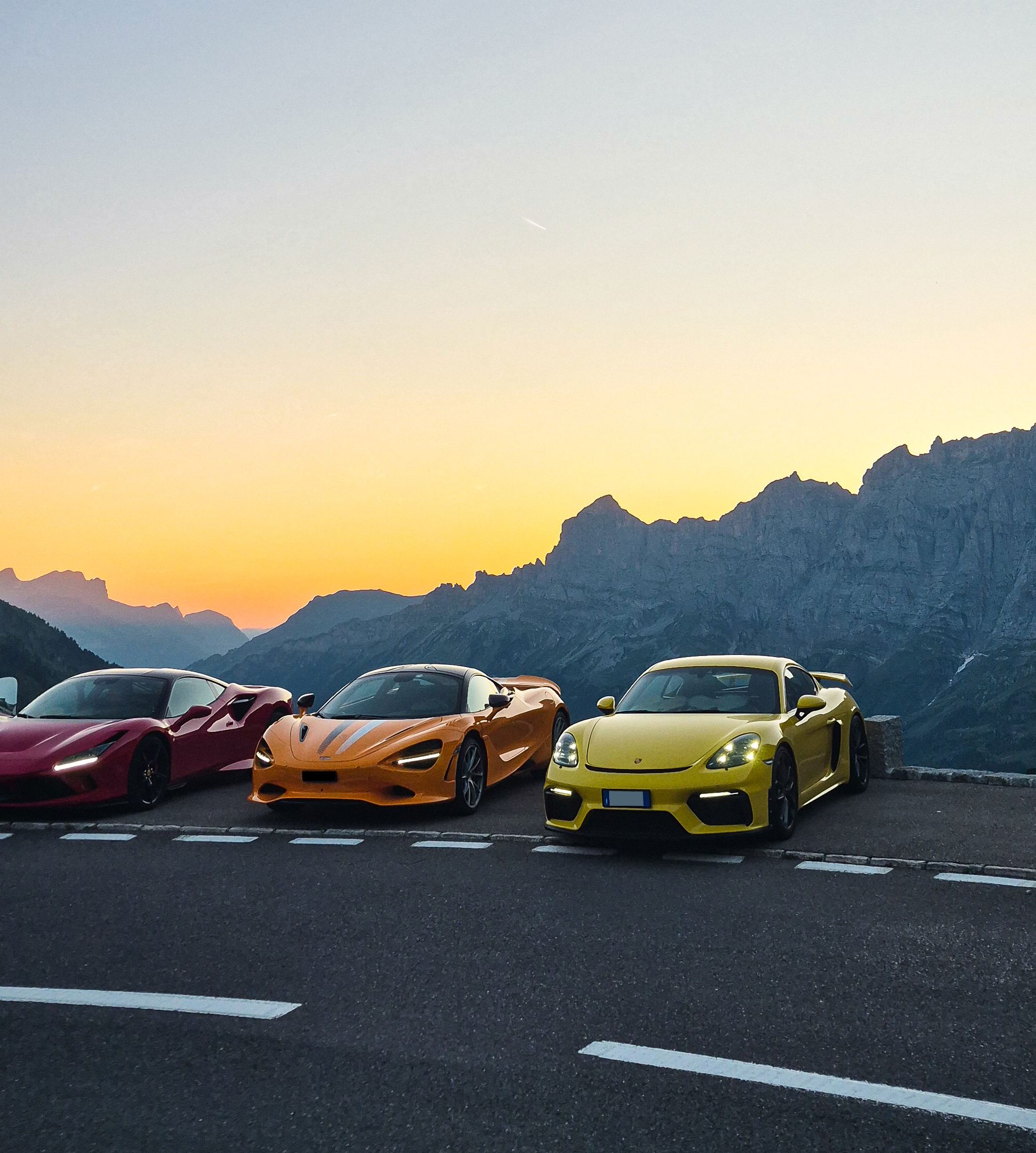 Aerial view of a winding Swiss Alpine pass road